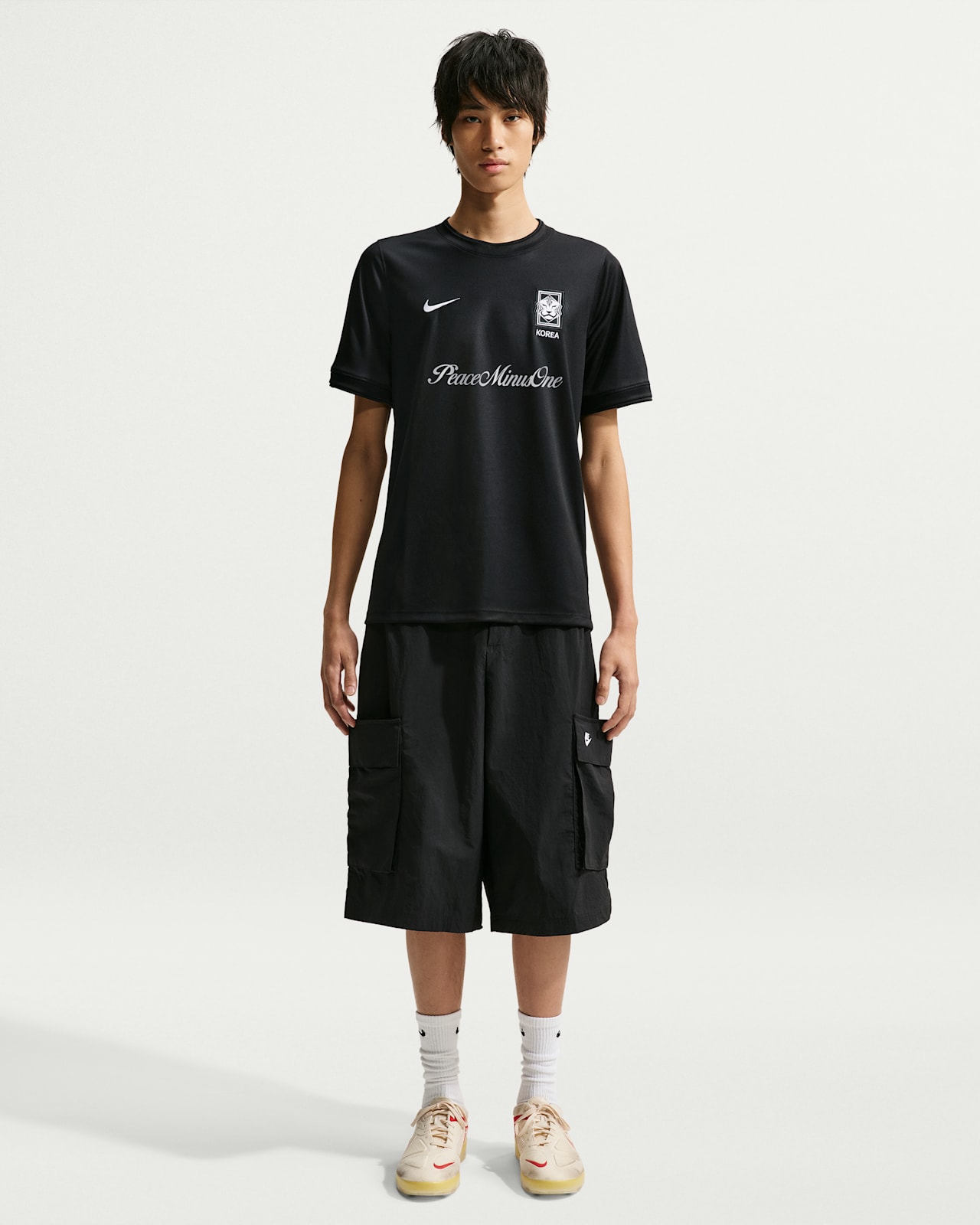 L 韓国 × ピースマイナスワン サッカートップス NIKE Tシャツ 新品 黒